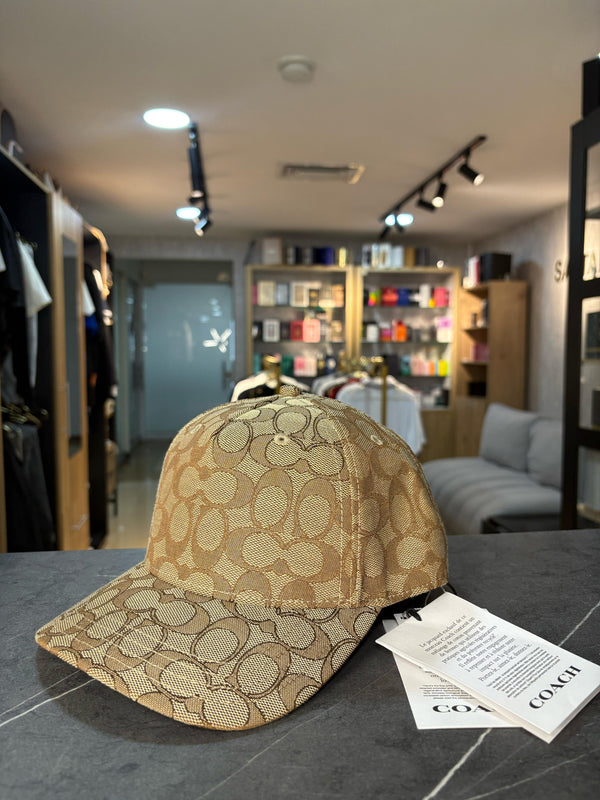 GORRA COACH DORADA
